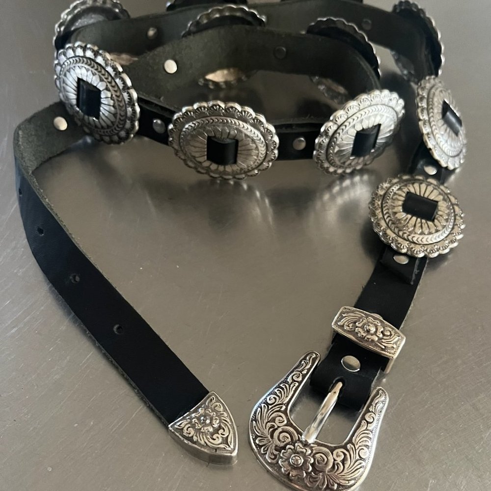 Black leather with silver tone Concho belt 5 holes